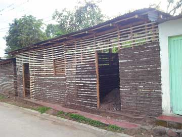 The new shanty very advanced. Walls built with a wattle and daub technique, about the same as the original construction